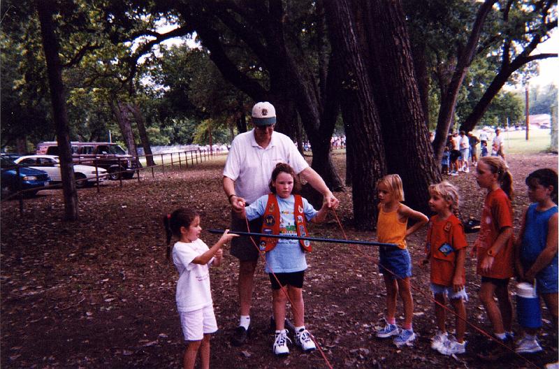 1998 - Indian Princess Opening Campout, Camp Carter, Fort Worth, TX - Blue Heron helping Stehanie with game.jpg - 1998 - Indian Princess Opening Campout, Camp Carter, Fort Worth, TX - Blue Heron helping Stehanie with game